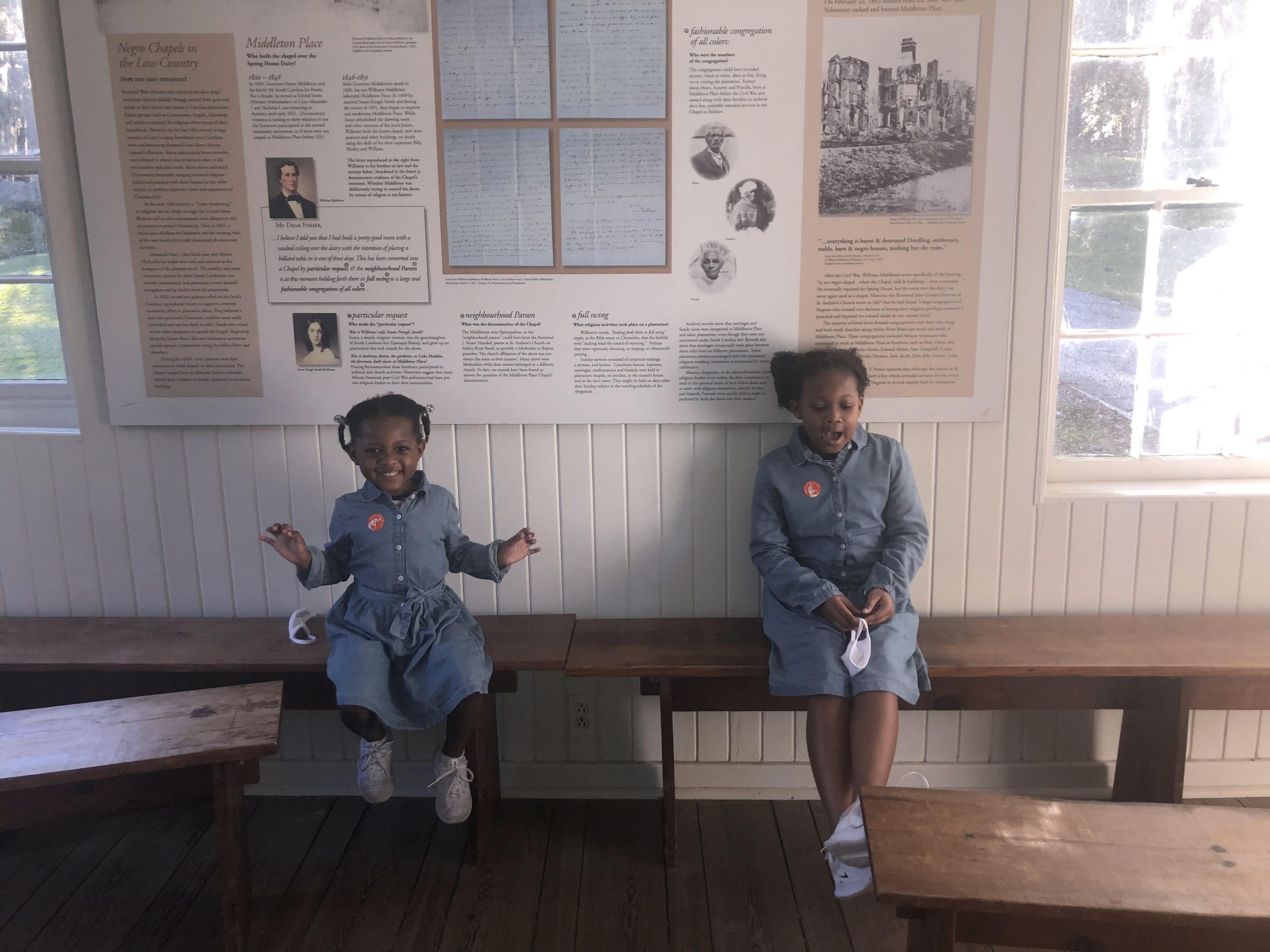 two girls learning about history