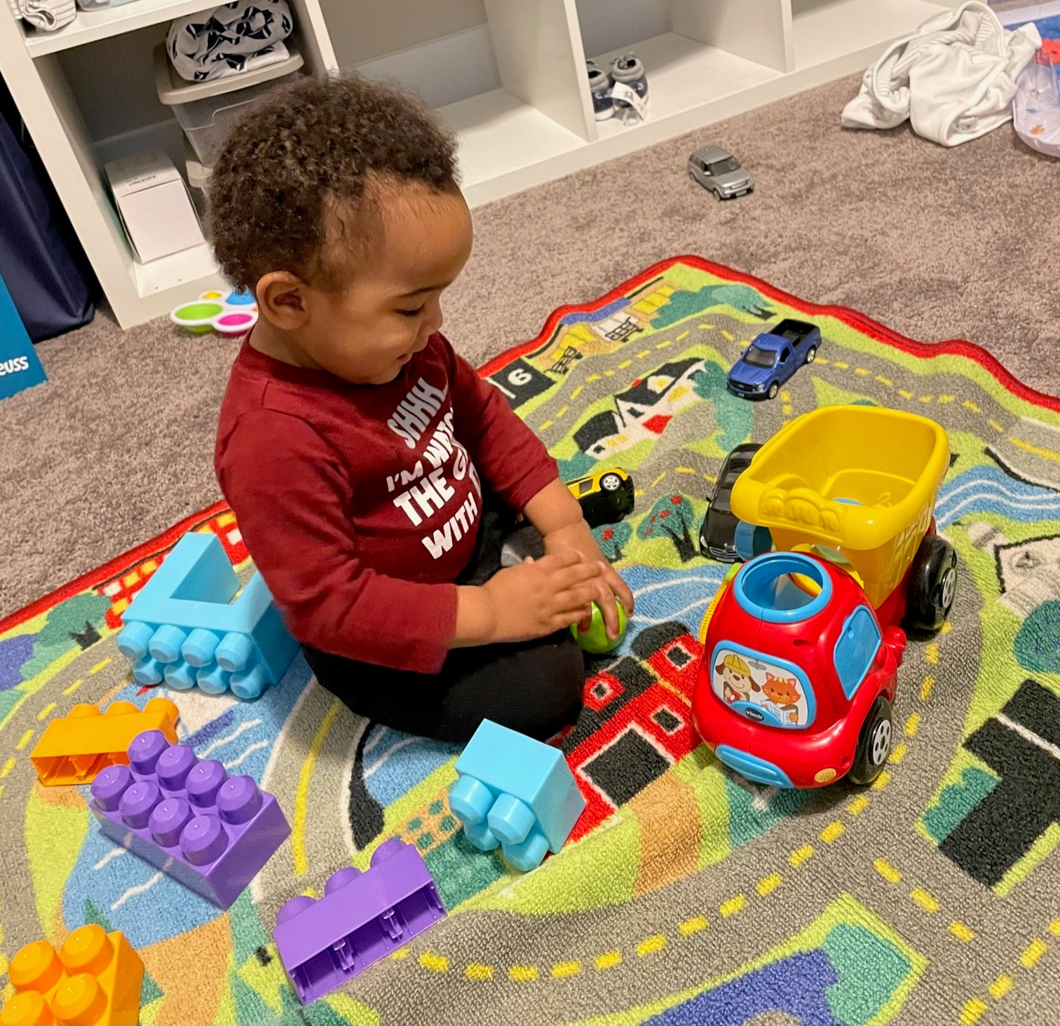 Toddler playing blocks